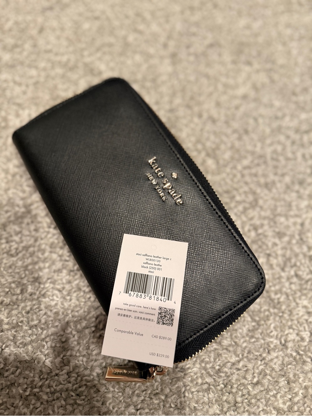 kate spade black saffiano zip wallet with gold logo
